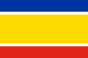 2004 Cyprus flag proposal: yellow with a blue and red stripes fimbriated white on top and bottom